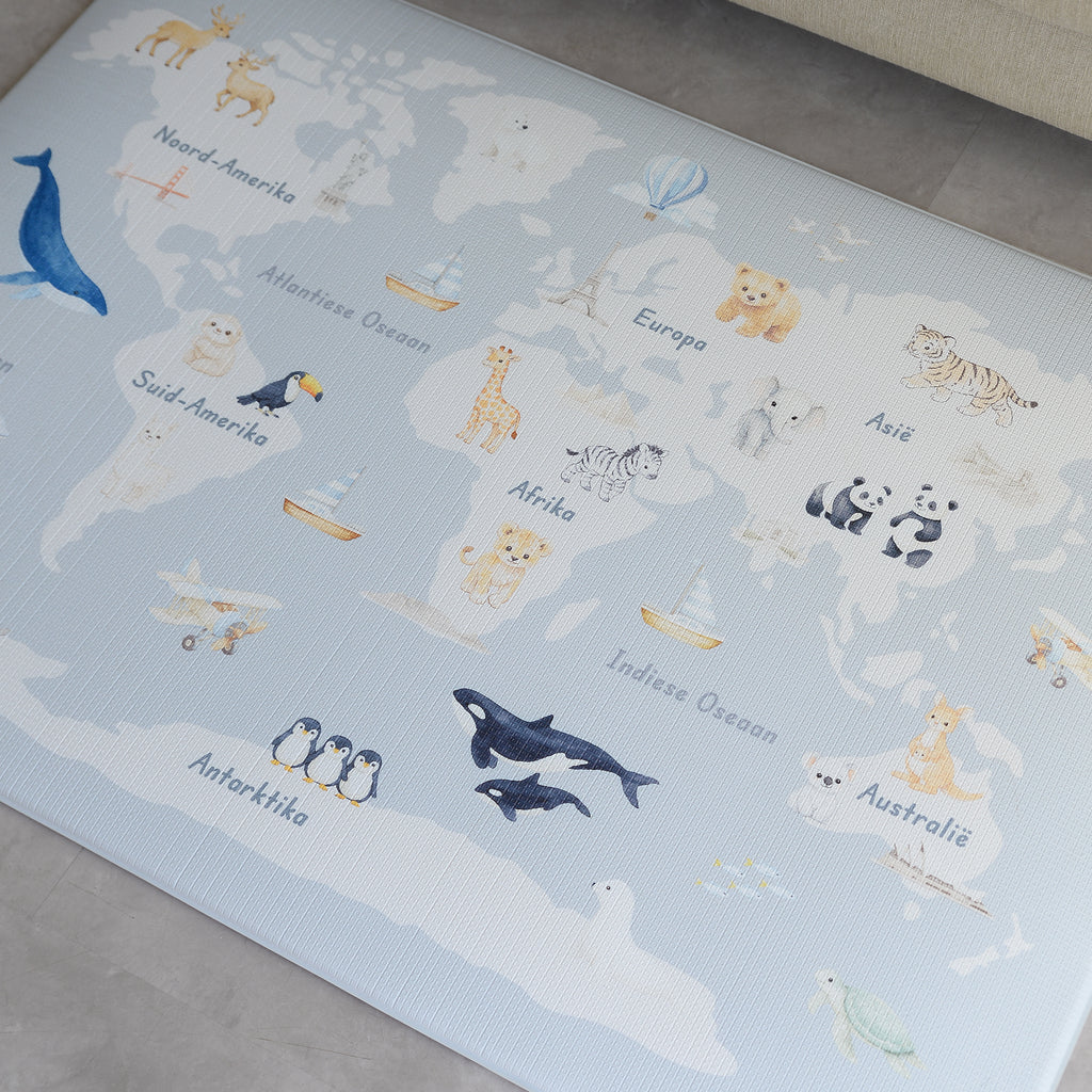 Children's play mat with animal illustrations on an Afrikaans world map