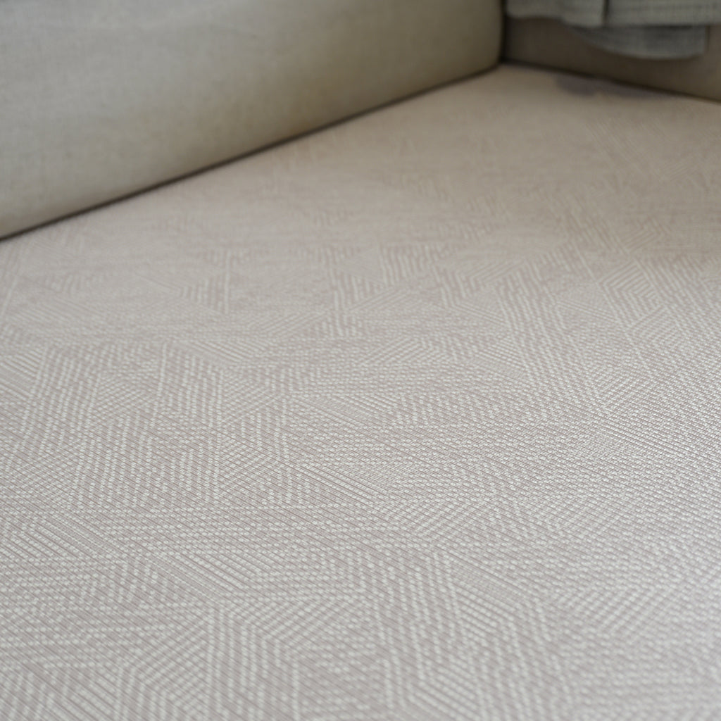 Close-up of a textured beige foam play mat