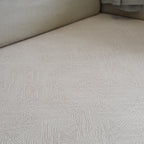 Close-up of a textured beige foam play mat