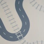 Play mat with road design on a light gray background