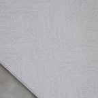 Dotted patterned play mat in a room
